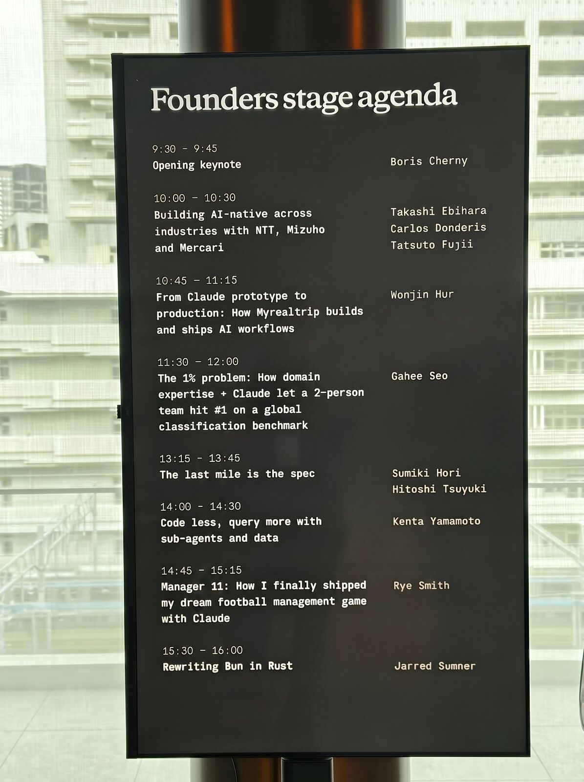 Founders stage agenda board for Code w/ Claude Tokyo